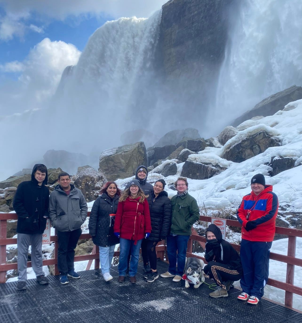 History Club students standing in front of frozen Niagara Falls, winter 2023.