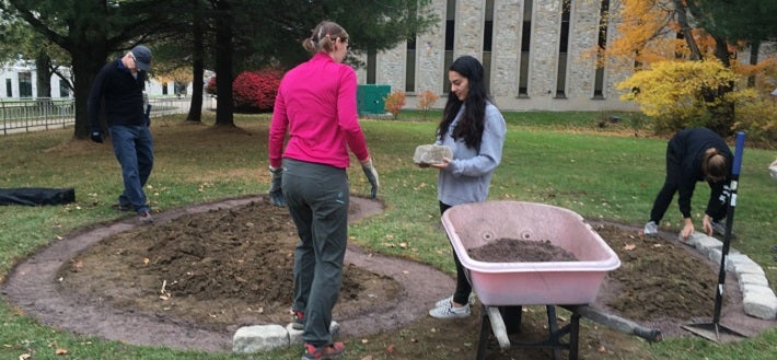 Green Team at work on the pollinator garden