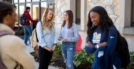 students talking outside 