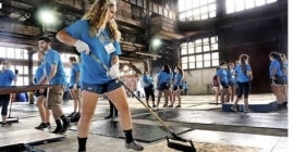 student helping out her community