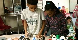 children building things out of toy blocks