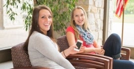two students in the Blackington Hall lobby