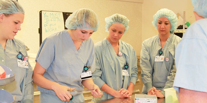 students wearing scrubs