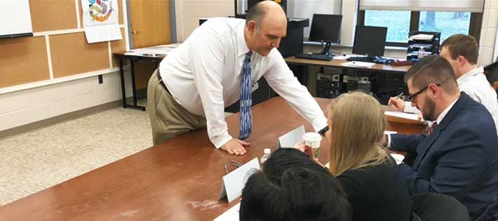 professor helping students