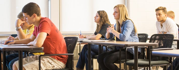 students sitting in a classroom