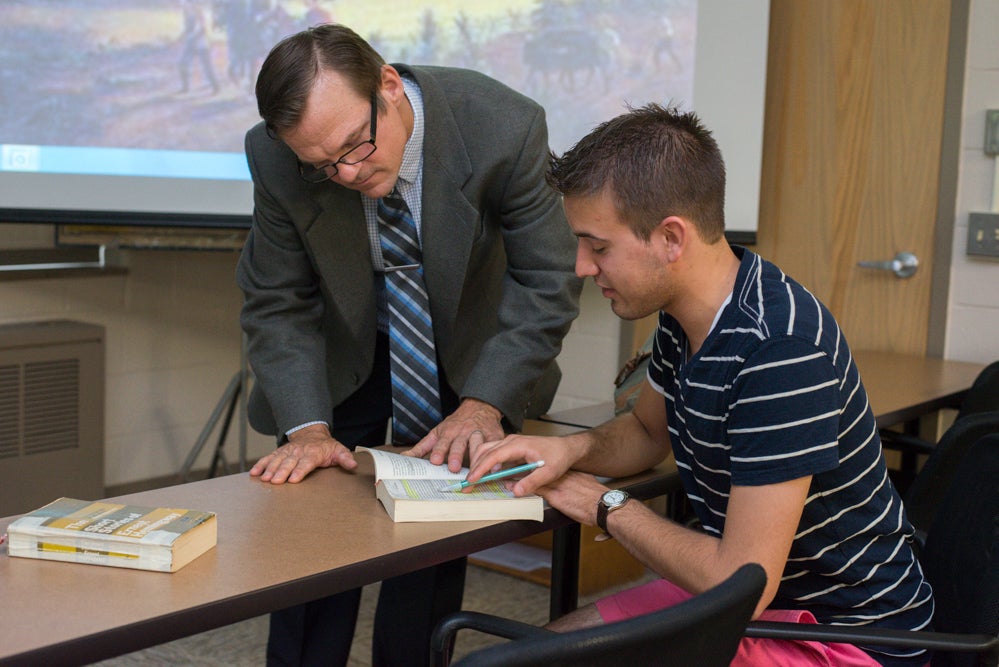 professor helping a student